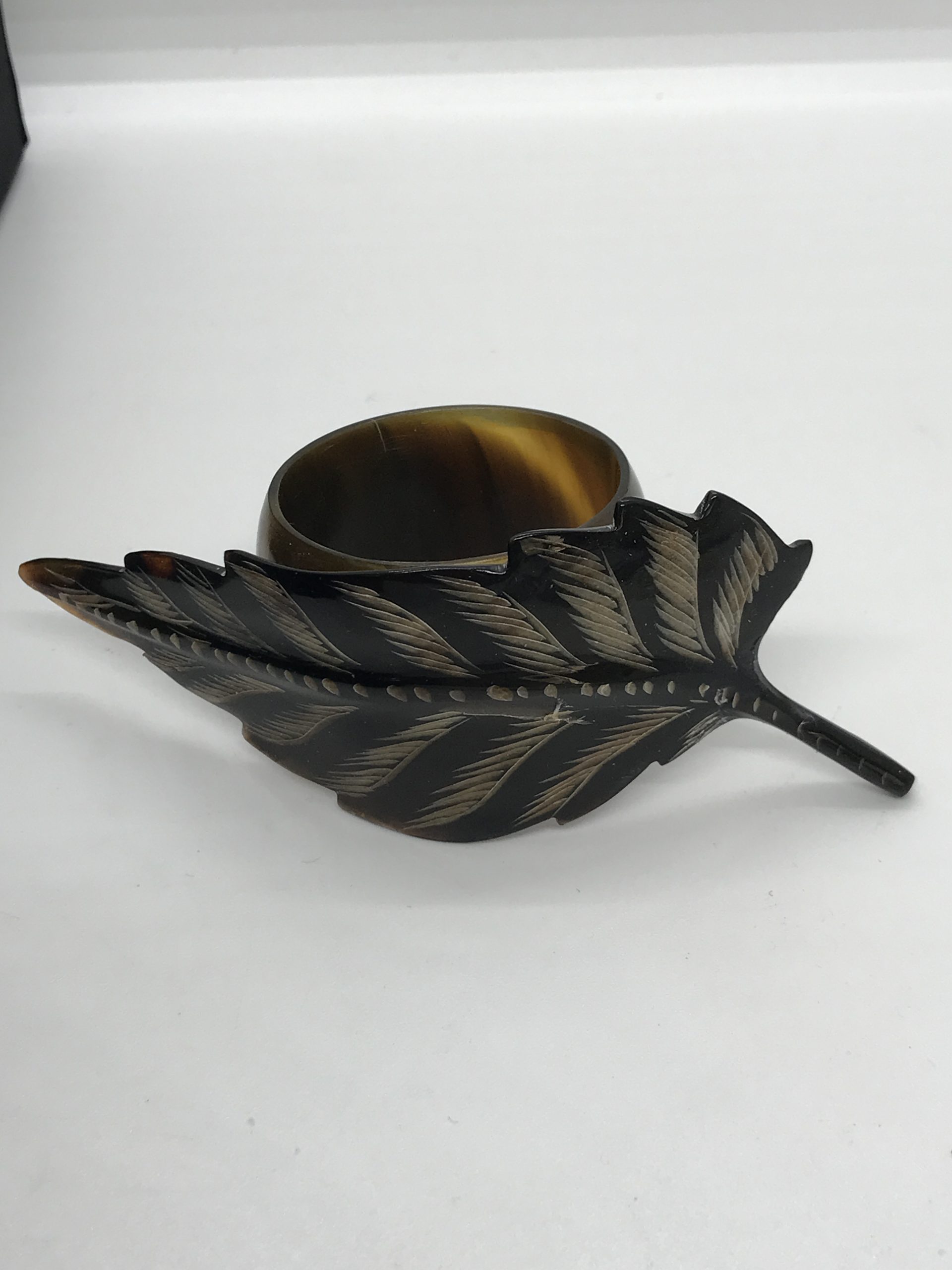 Set of 6 Cattle Horn Napkin Rings with Feather Overlay