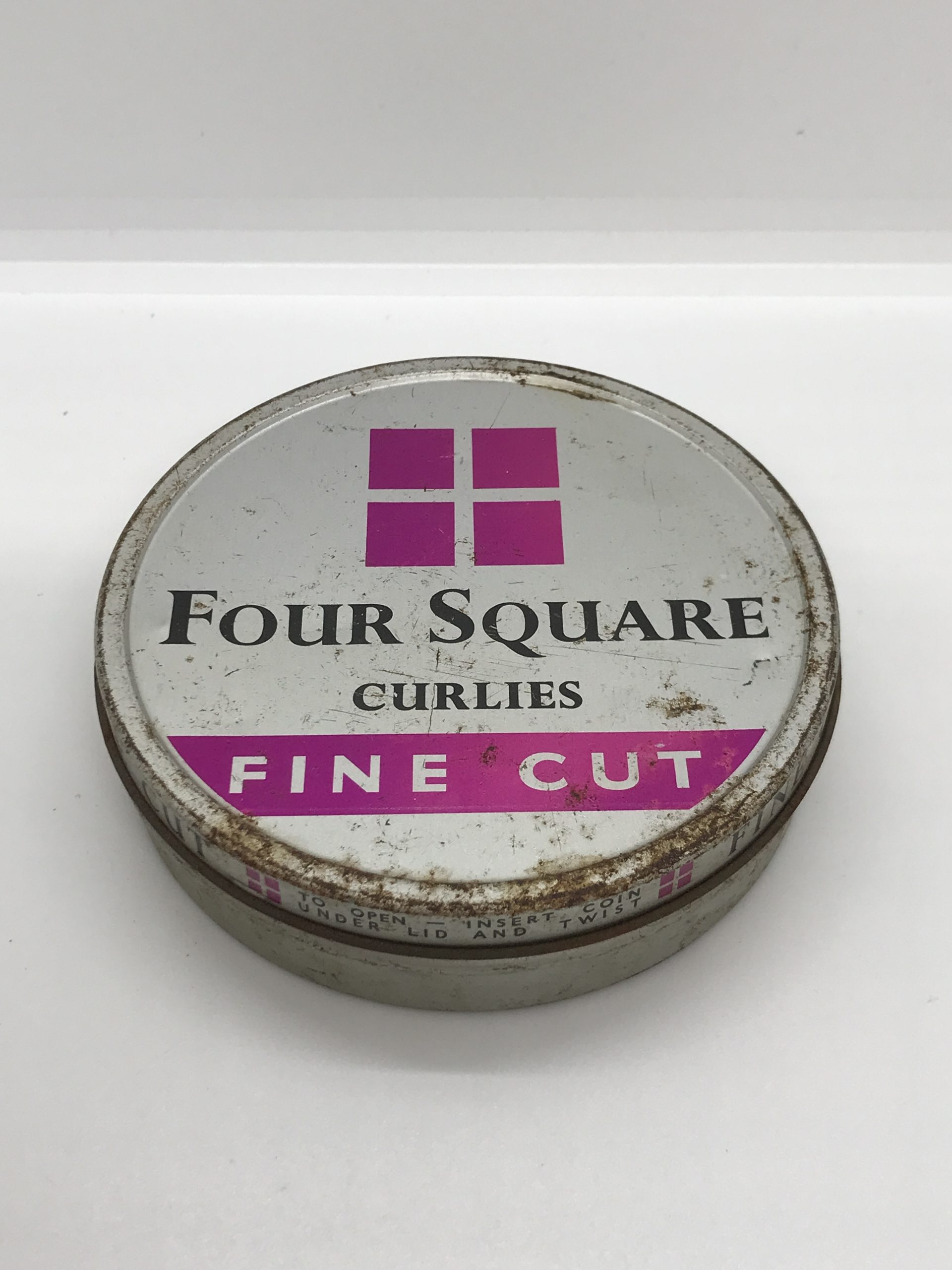 Four Square Curlies Fine Cut Round Tobacco Tin