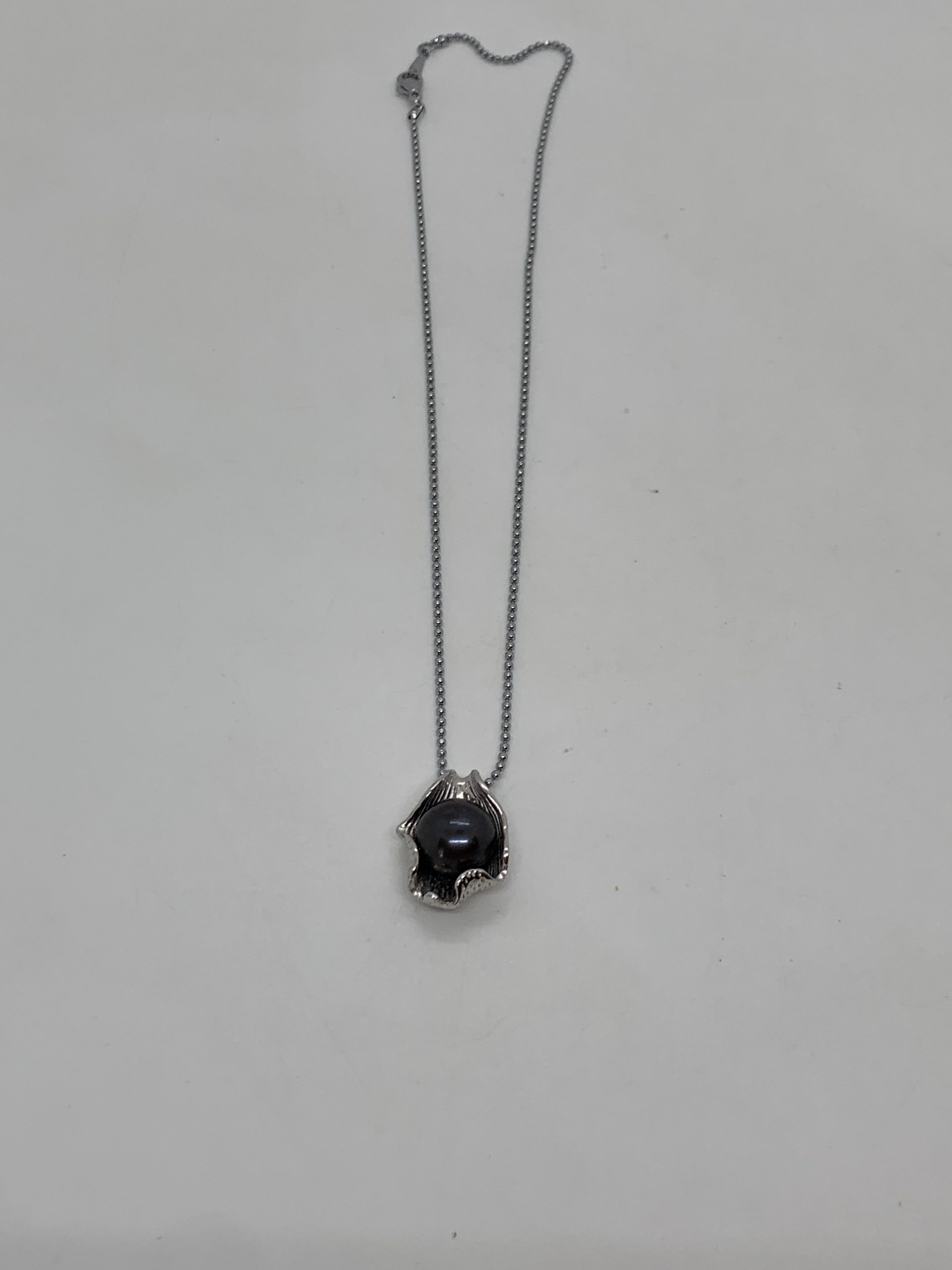 12mm black freshwater Pearl in Sterling Silver Mount