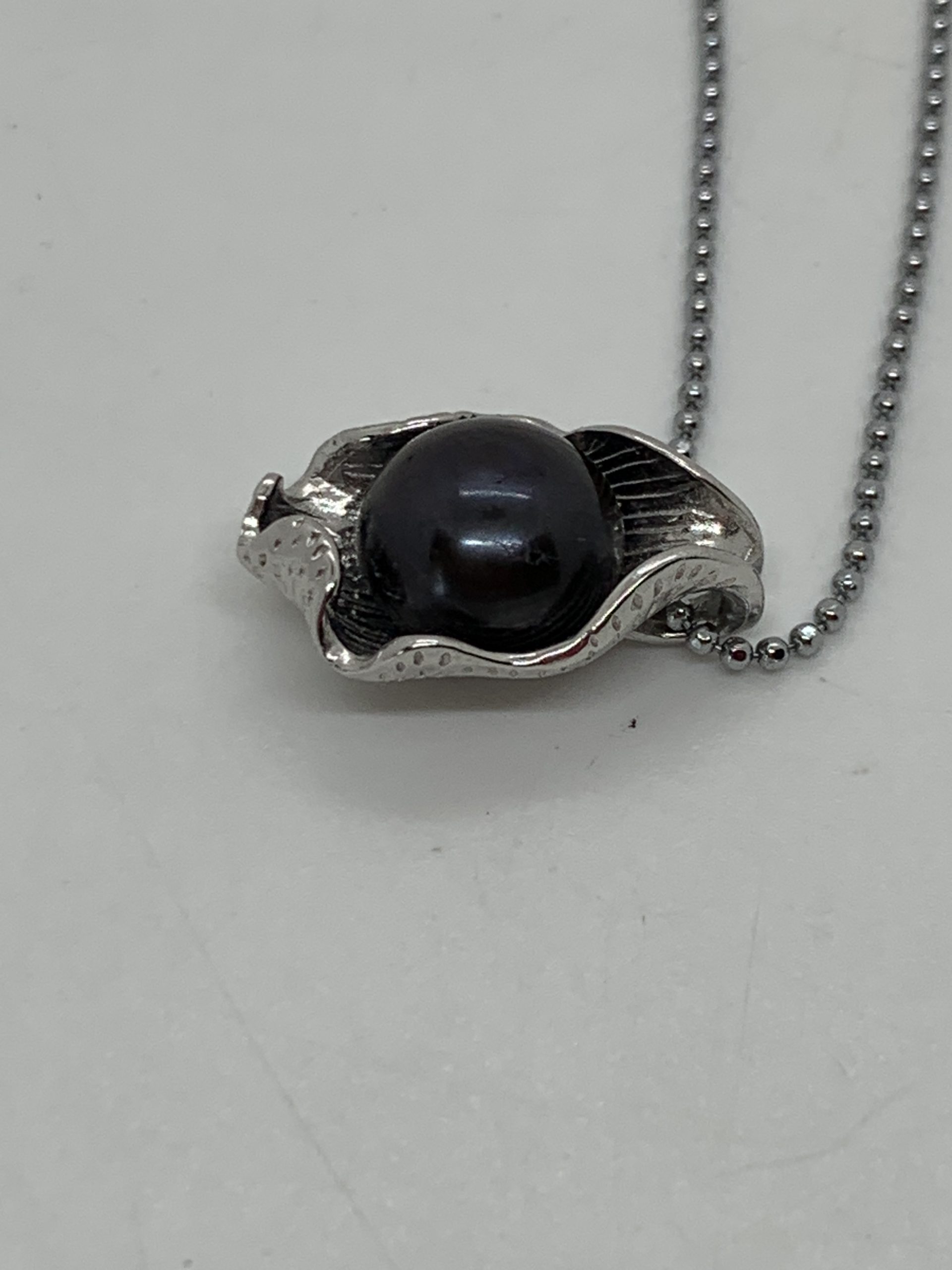 12mm black freshwater Pearl in Sterling Silver Mount