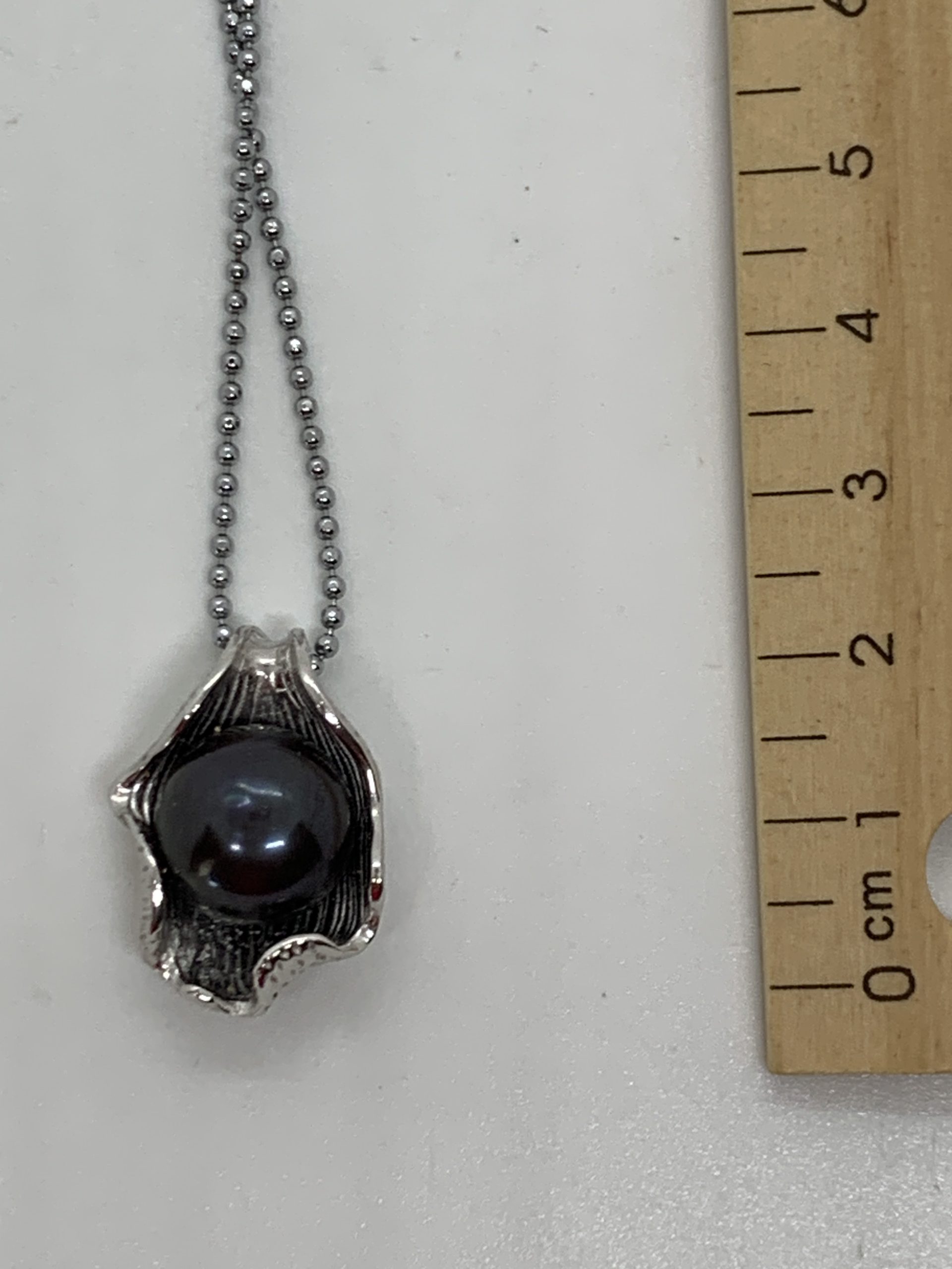 12mm black freshwater Pearl in Sterling Silver Mount